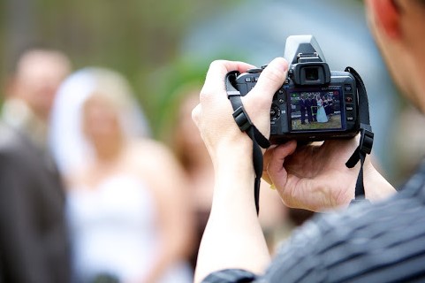 a photographer with a camera